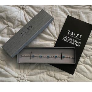 Sterling Silver (925) Oval Swiss Blue Topaz Infinity Link Bracelet